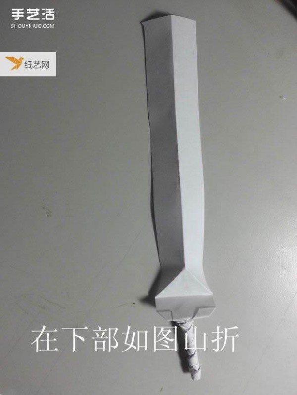 Share a detailed illustration of how to learn to fold a paper katana sword