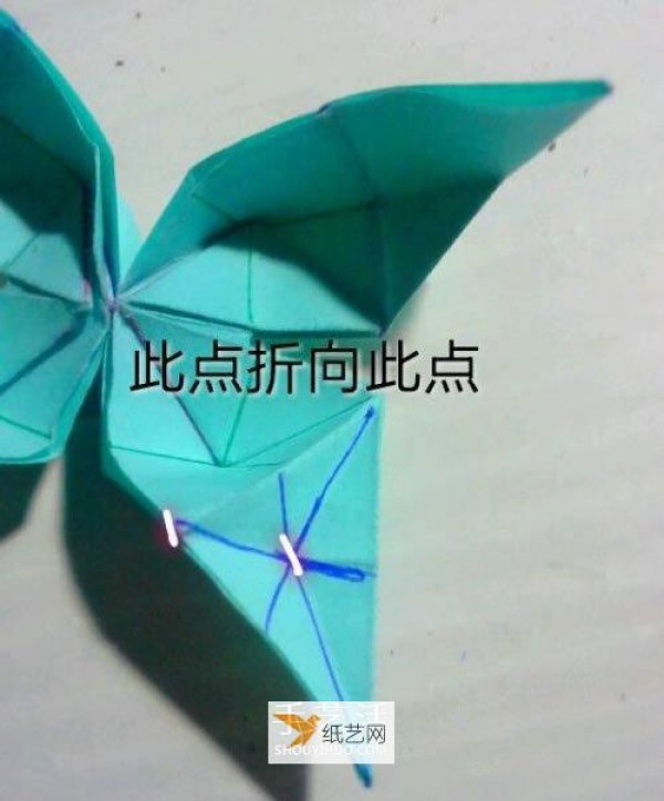 Illustrated tutorial for hand folding origami swallowtail butterfly