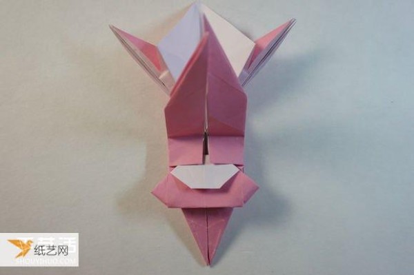 Illustrated step-by-step tutorial for girls using origami to fold something that looks complicated