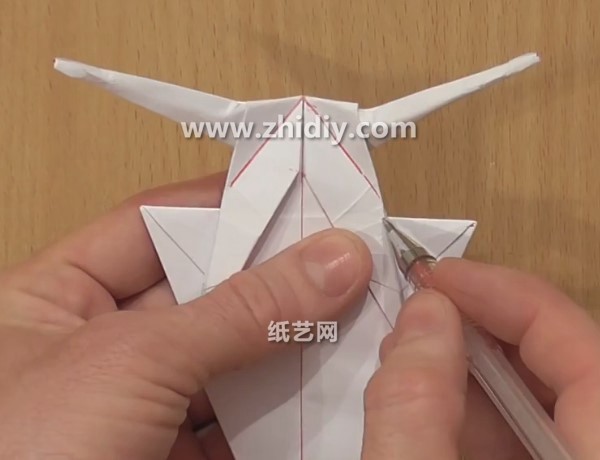 Origami tutorial for simple origami snail