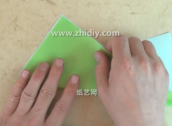 Tutorial on how to make a simple origami broom by hand