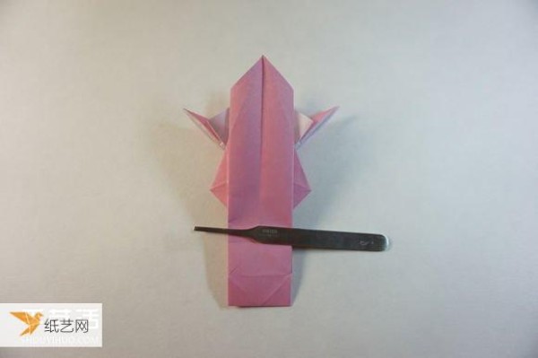 Illustrated step-by-step tutorial for girls using origami to fold something that looks complicated