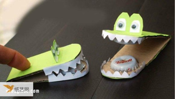 Make a personalized toddler alligator toy using cardboard and metal bottle caps