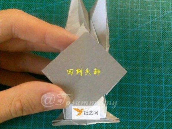 Illustration of how to prepare origami to fold Bugs Bunny