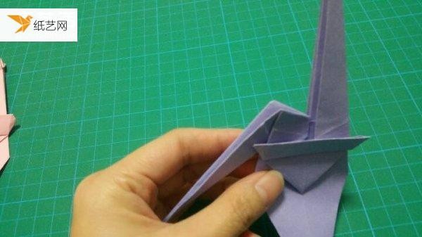 A very simple origami tutorial of a monkey climbing a tree