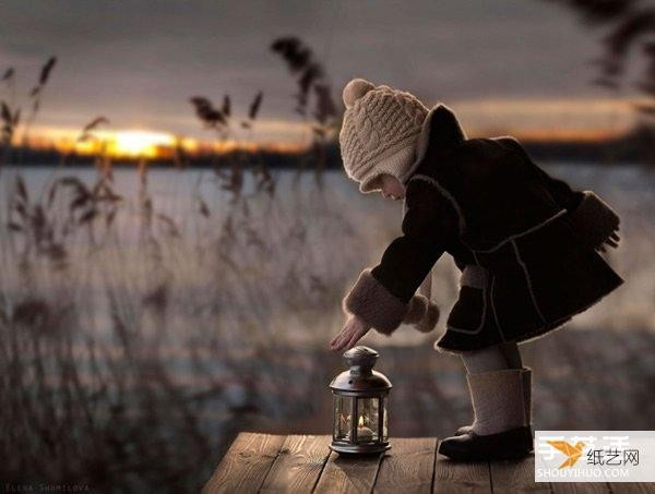 Appreciate the warm photography of a very cute little boy and animals