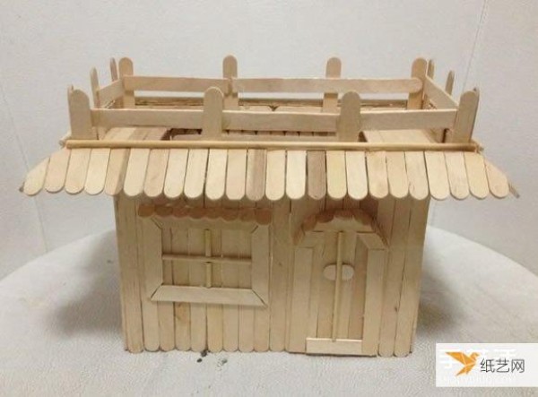 Tutorial on making a personalized two-story house model built with ice cream sticks