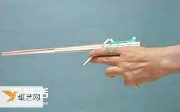 Illustration of how to make your own repeating rubber band gun