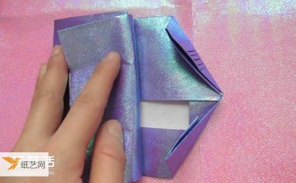 Simple illustration of a multi-layered wallet folded using origami