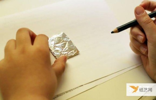 Tutorial on how to make simple childrens necklace charms using tin foil