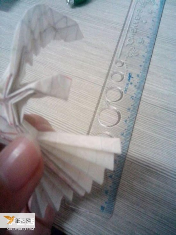 Illustration of the origami method of hand-folding a beautiful three-dimensional angel