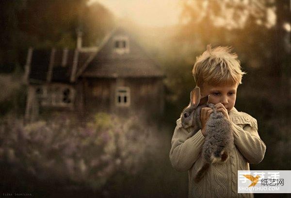 Appreciate the warm photography of a very cute little boy and animals