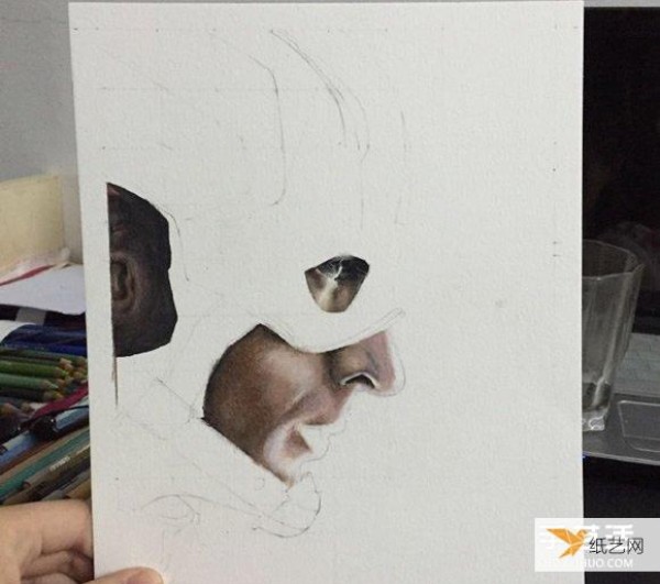 Share in detail the steps of painting Captain America with colored pencils