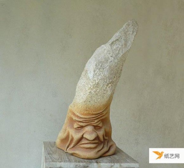 A pair of skillful hands create stone sculptures with smooth and natural curves