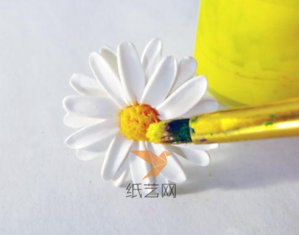 A fresh tutorial on how to make a daisy ring from clay