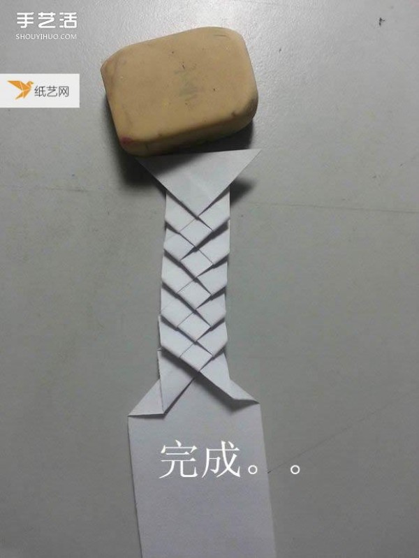 Share a detailed illustration of how to learn to fold a paper katana sword