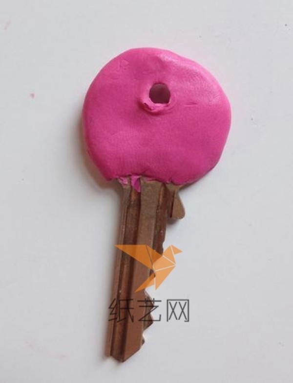 Kitten shaped key decoration made from clay