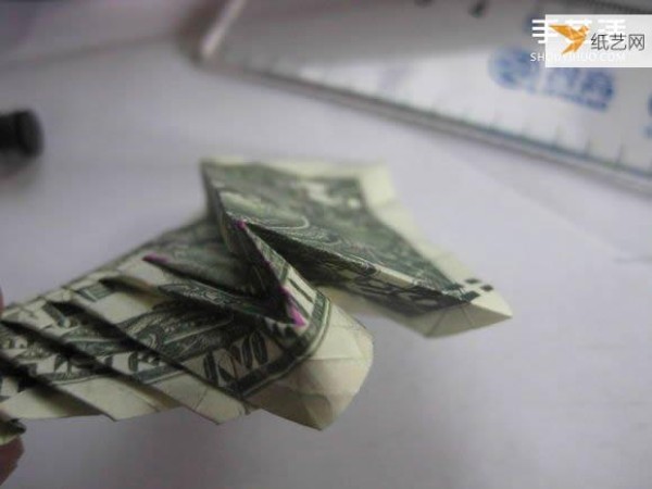 How to fold paper carp using dollars