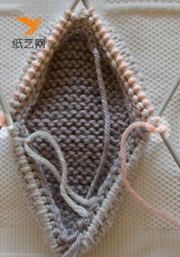 Illustration of hand-knitted baby woolen shoes