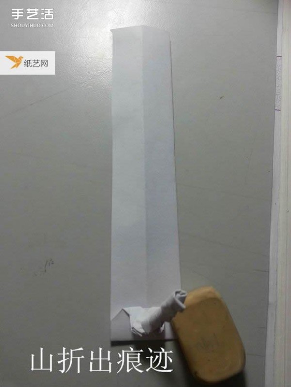 Share a detailed illustration of how to learn to fold a paper katana sword