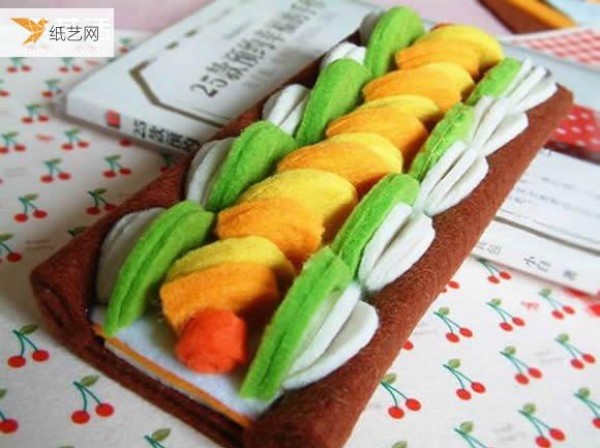 Pictures of handmade fruit delicacies models using non-woven materials