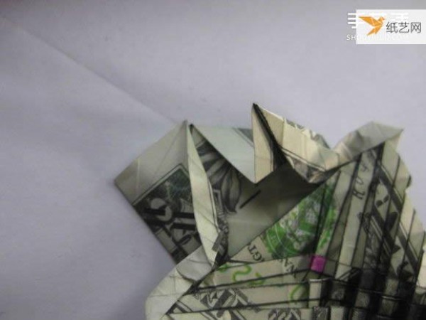 How to fold paper carp using dollars