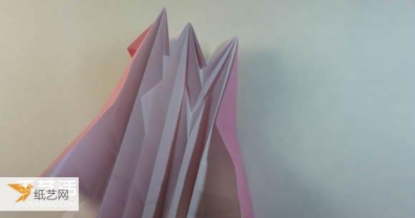 Illustrated step-by-step tutorial for girls using origami to fold something that looks complicated