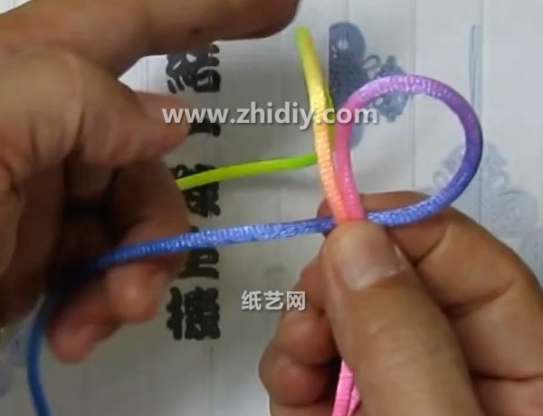 How to weave a flat Chinese knot—an introductory tutorial on how to weave a Chinese knot