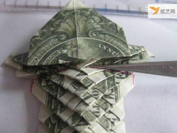 How to fold paper carp using dollars