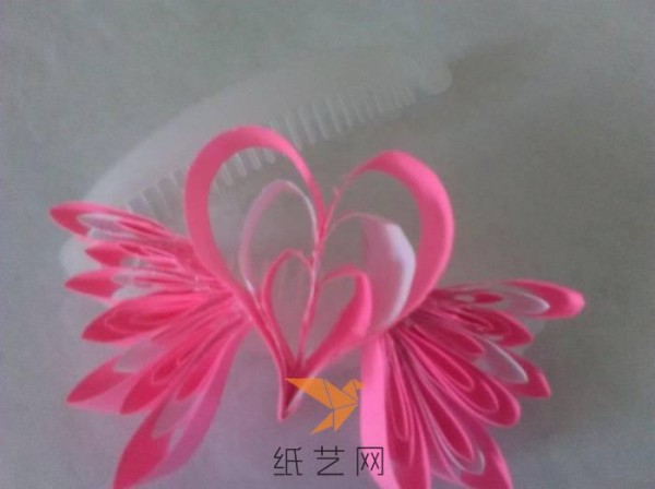 Tutorial on how to make a paper-quilled heart with wings for Valentine’s Day