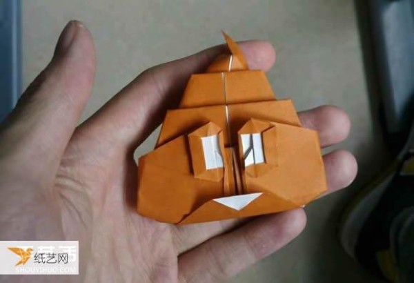 Illustrated step-by-step tutorial for making handmade cartoon poop using origami