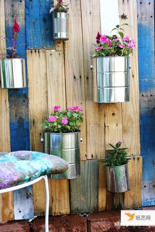 Use iron can waste to create vertical sky gardens in your yard or balcony