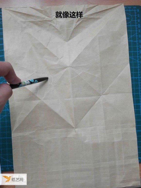 Detailed step-by-step illustration of using origami to fold a complex three-dimensional rabbit head