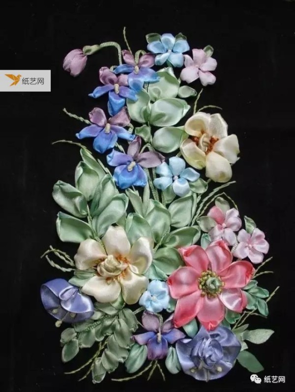 The flowers embroidered with beautiful ribbons are so beautiful! Tutorial attached!