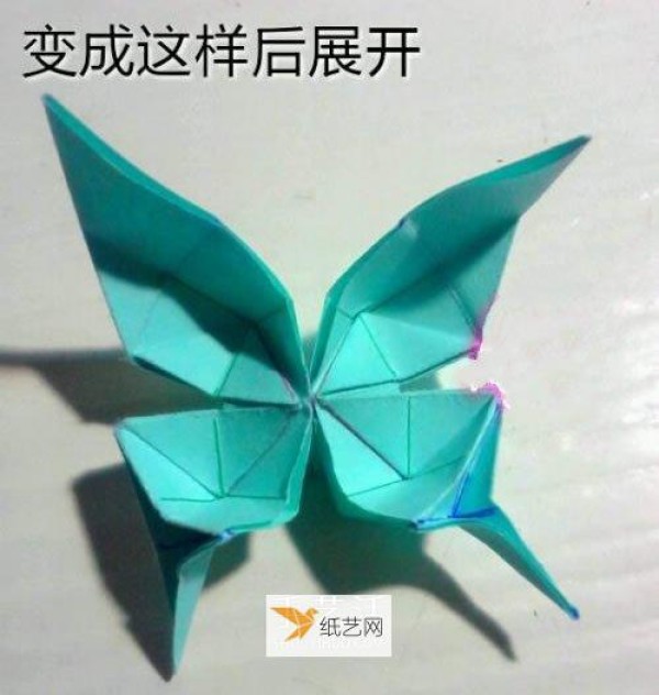 Illustrated tutorial for hand-folding origami swallowtail butterfly