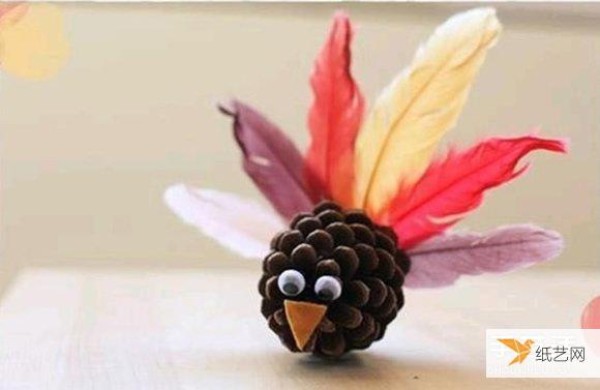 Simple and cute pine cone small handmade bird creation for children