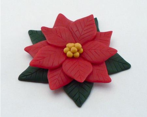 Adorable DIY tutorial for making Christmas flowers from super light clay