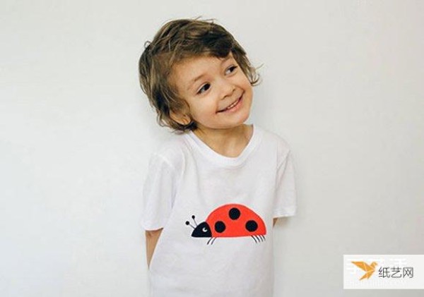 Mom gives her son a hand-drawn personalized T-shirt as a loving gift