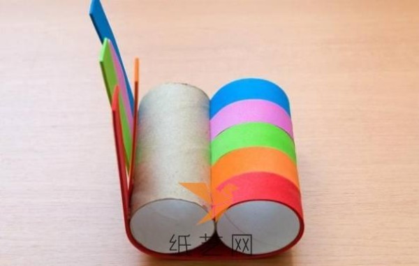 Tutorial on using toilet paper tube waste to make a rainbow telescope toy