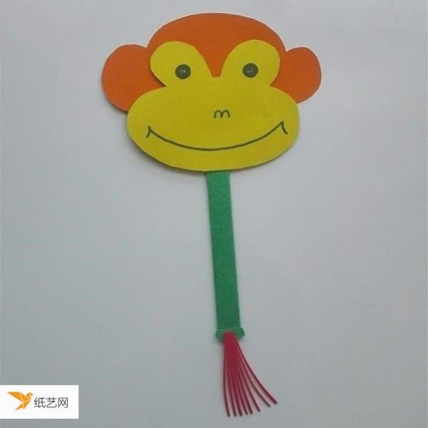 Picture of how to make a kindergarten monkey fan by hand using cardboard