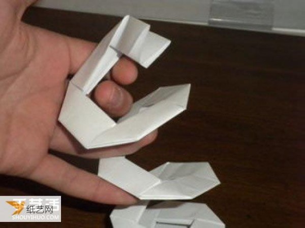 Illustrated step-by-step tutorial for children to use origami to fold a simple spring