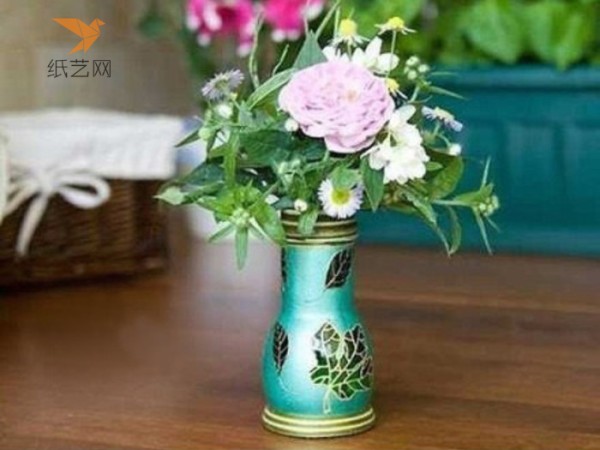 Tutorial on turning waste into treasure. DIY tutorial on transforming a finished milk glass bottle into a retro-style vase.