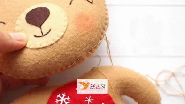 Super cute New Year bear doll made of non-woven fabric