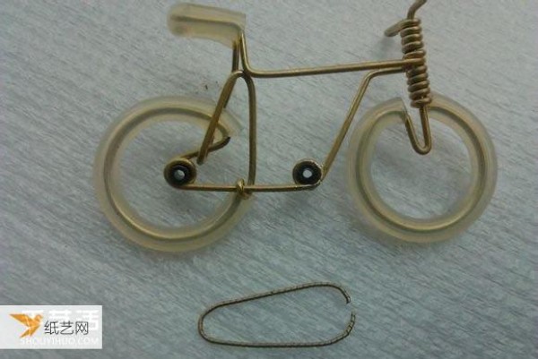 Illustrated tutorial for making a compact bicycle by hand using copper wire