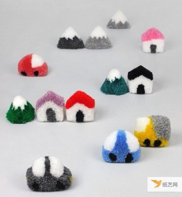 Tutorial on how to make a cute little house using yarn balls