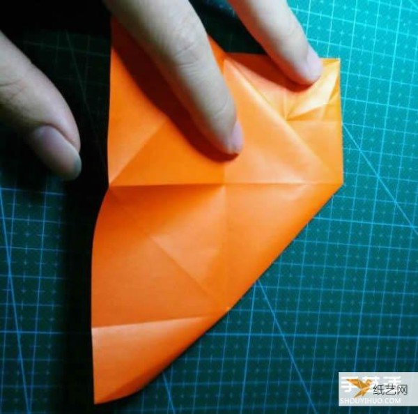 Detailed explanation of the manual method of folding a paper kingfisher tutorial.