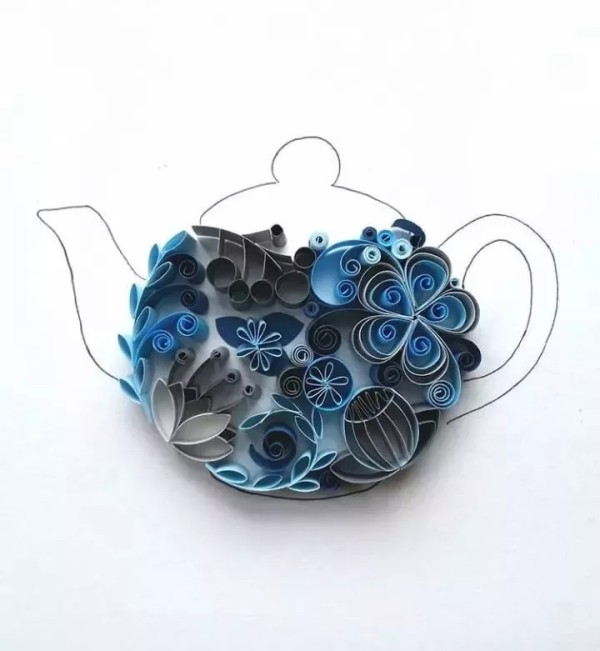 So beautiful! She combines paper quilling and flower arrangement!