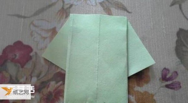 Illustration of a simple shirt folded by hand for children