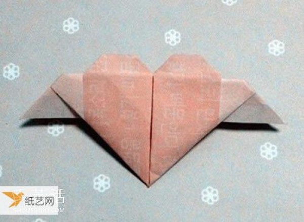 How to fold some winged paper hearts