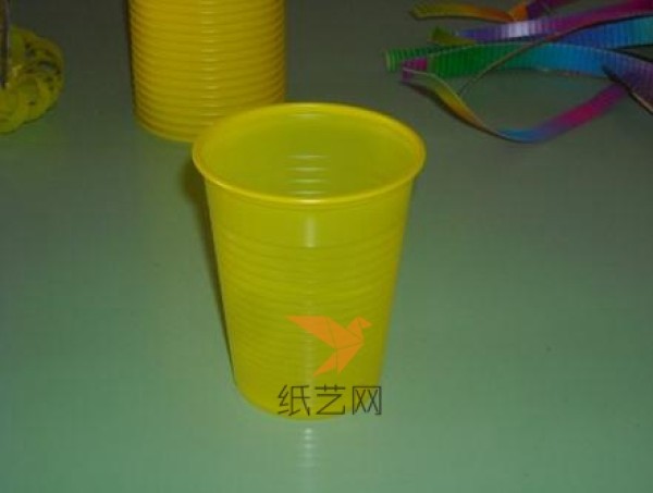 Childrens handicraft: using plastic cup waste to make a cute little basket